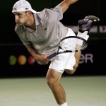 Roddick of the US serves to Lammer of Switzerland during the Australian Open tennis tournament in Me